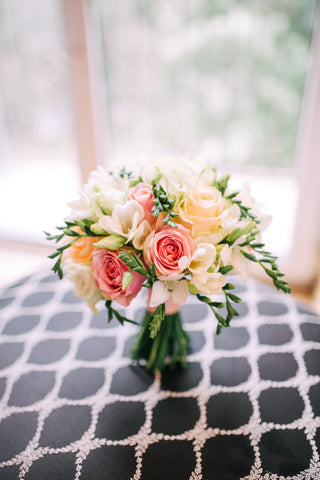 Beautiful bridal and prom bouquet with roses and freesia