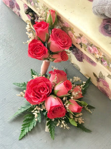 Corsage and boutonnière in pink