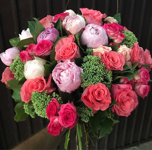 Beautiful bouquet of pink peonies and roses