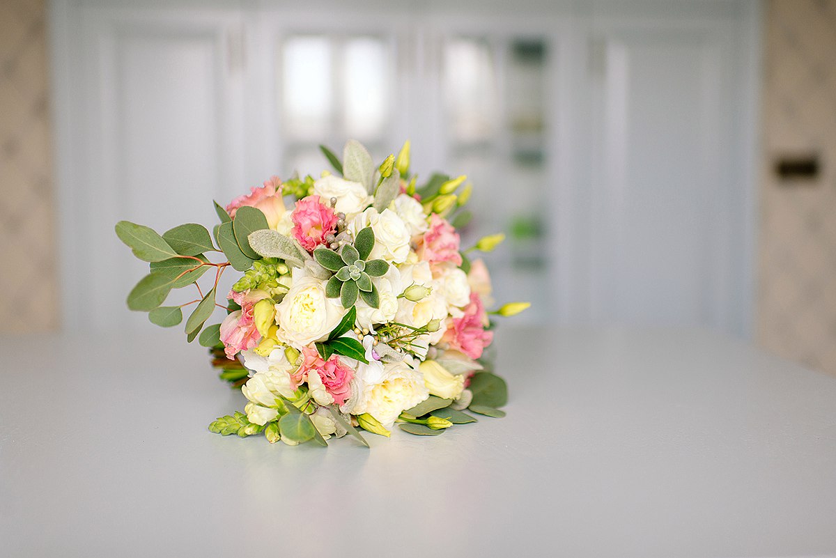 Bridal and prom bouquet with Austin`s roses,  freesia, succulent and lisianthus.