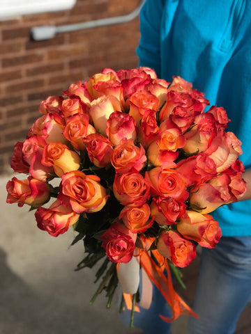 Brighten their home with the gift of sunshine! Since this cheerful bouquet is so affordable, why not bring sunshine indoors at your house, too?  Includes:  Fifty orange roses Free message card